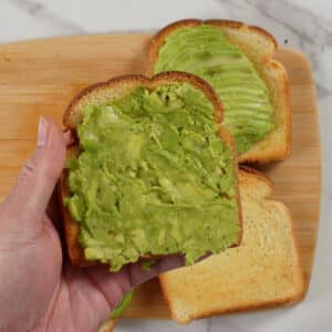 Spread mashed avocado on toast