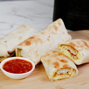 Air fryer breakfast burrito recipe served with salsa.
