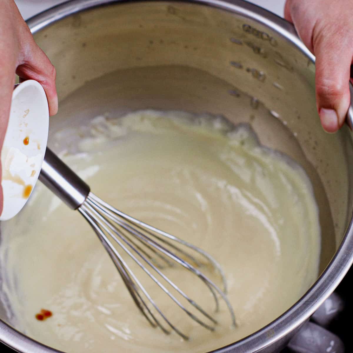 Step 4: Mixing vanilla to egg tart filling.