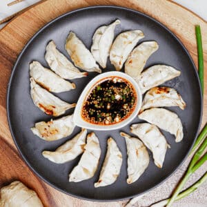 Cooked air fryer frozen potstickers recipe, with savory dipping sauce