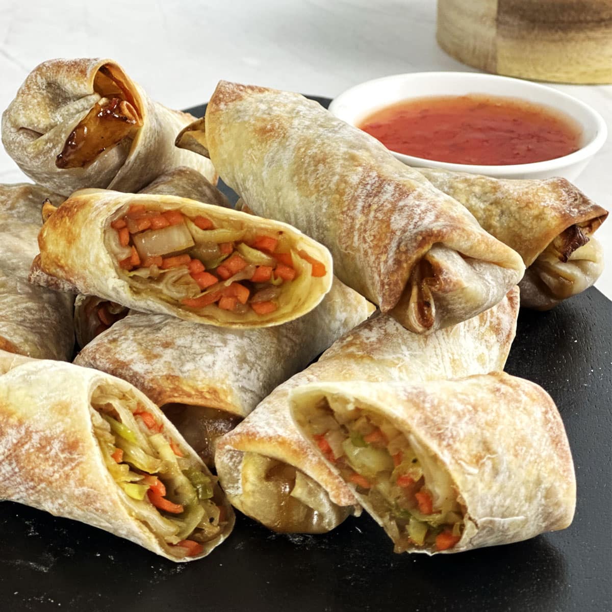 Air fried vegetable egg rolls served with sweet chili sauce