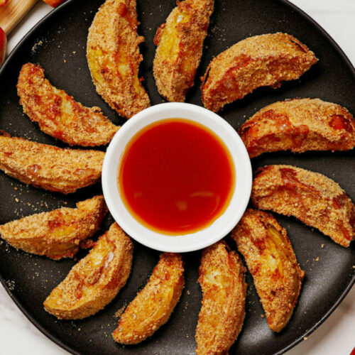 Air fryer apple fries served with caramel dipping sauce