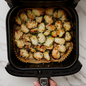 Cooked parmesan crusted Brussels sprouts in air fryer