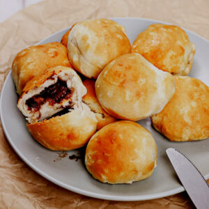 Stuffed air fryer Pillsbury country biscuits served on a plate.