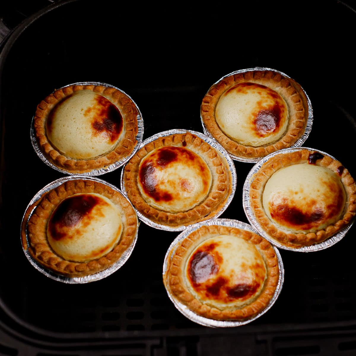 Step 7: Cooking Portuguese egg tarts in air fryer.