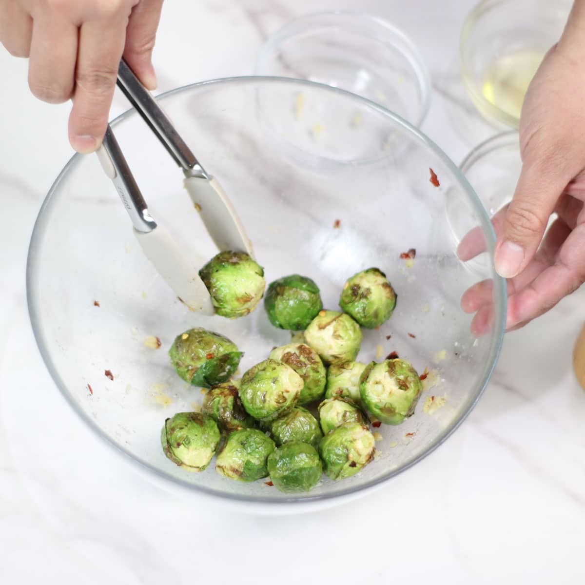 Seasoning whole Brussels sprouts