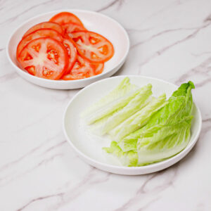 Step 2: Sliced tomatoes and lettuce.
