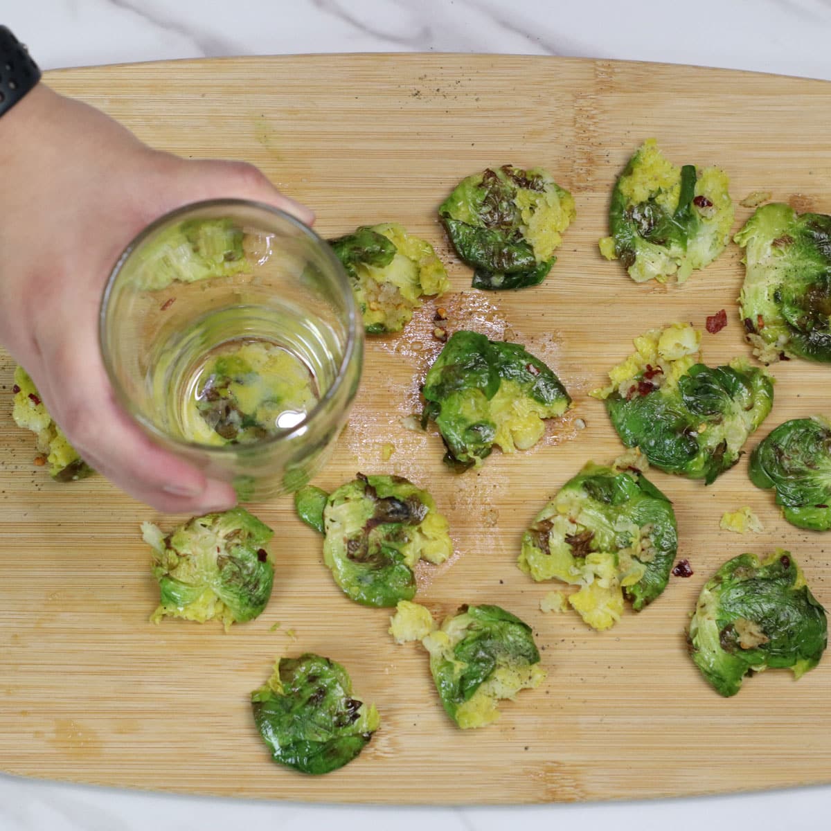 Smashing Brussels sprouts with glass