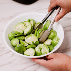 Coating Brussels sprouts with oil