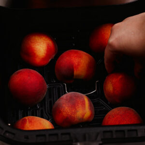 Grilling peaches in air fryer, cut-side down