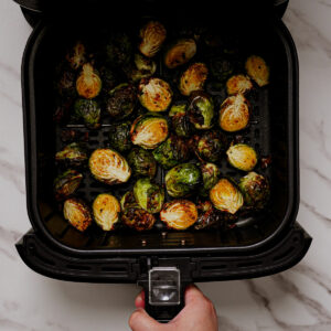 Cooking Brussels sprouts in air fryer.