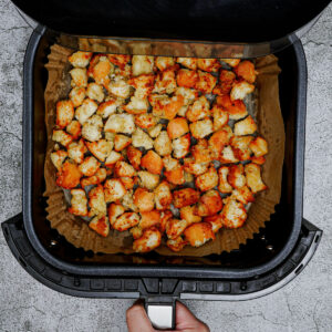 Cooking croutons in air fryer.