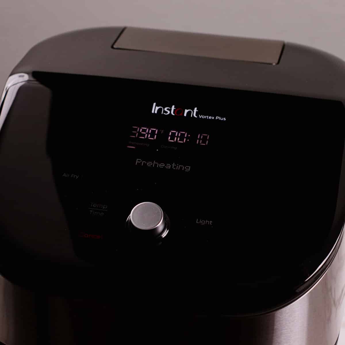 Preheating air fryer to 390°F.