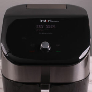 Preating Instant Pot Vortex Plus Air Fryer to 330°F (166°C).