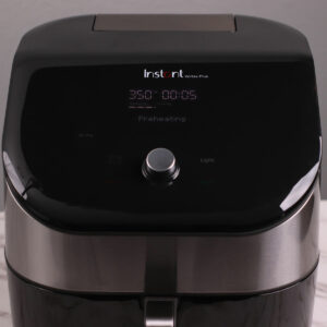 Preheating Instant Pot Vortex Plus Air Fryer to 350°F (177°C).
