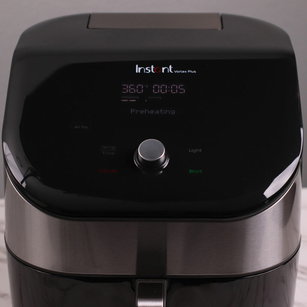 Preheating Instant Pot Vortex Plus Air Fryer to 360°F (182°C).