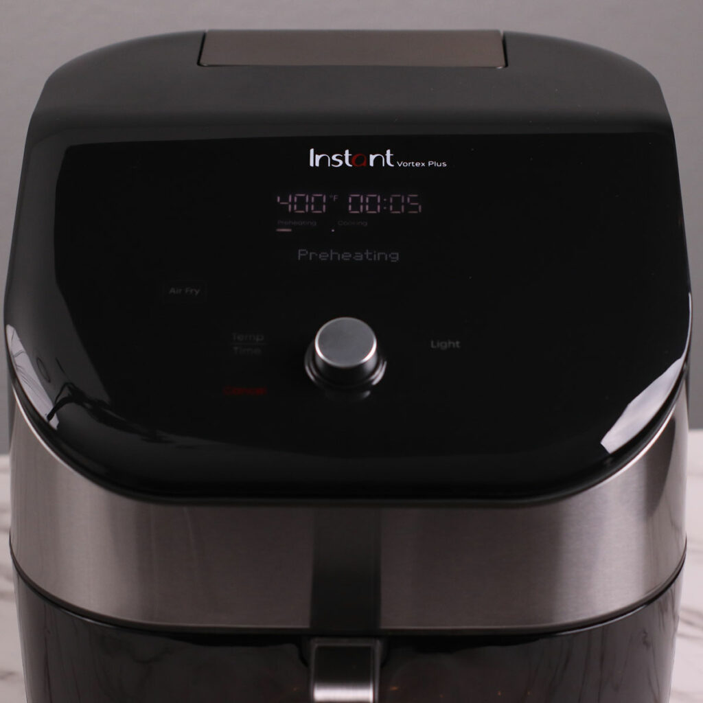 Preating Instant Pot Vortex Plus Air Fryer to 400°F (204°C).