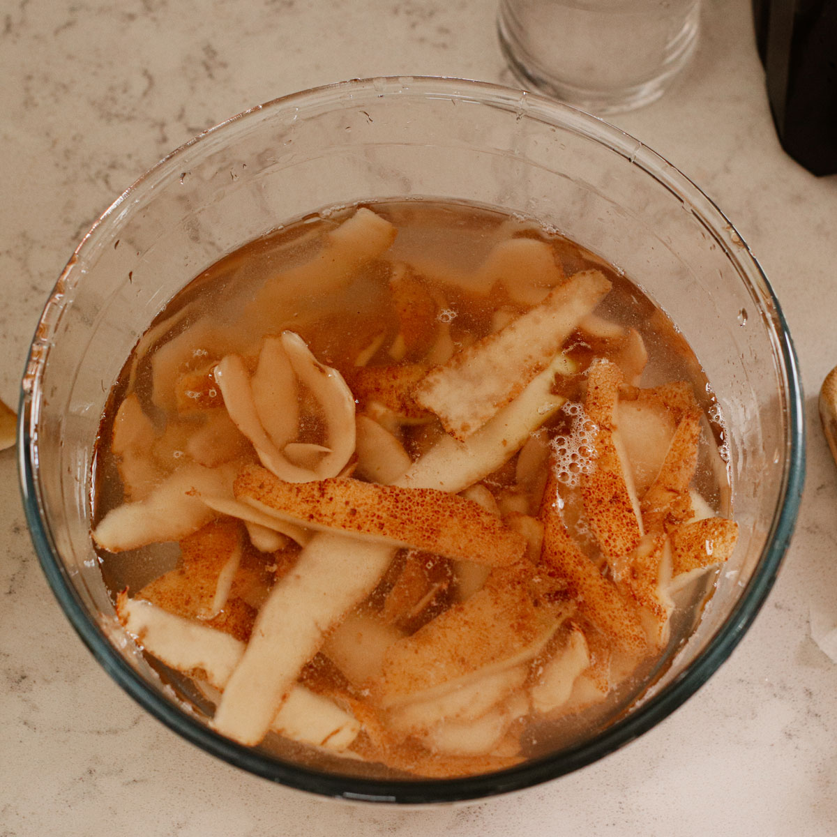 Potato peels soaked in cold water.