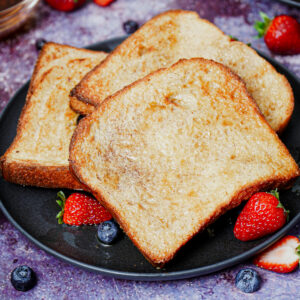 Air fried French toasts served with berries.