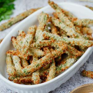 Air fried green bean fries served on a baking dish.