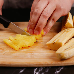 Slicing jackfruit and banana