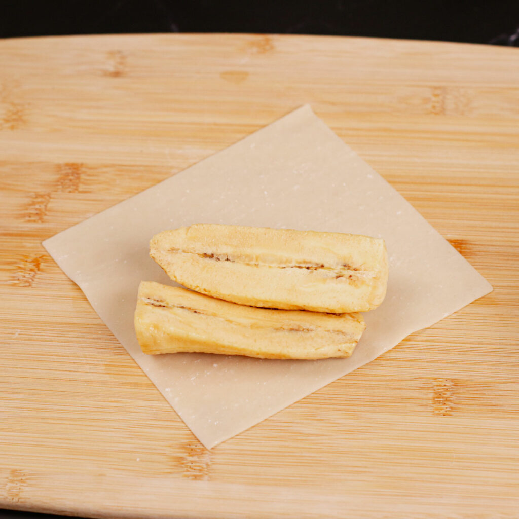 Step 2: Place the banana slices on the egg roll wrapper