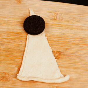 Step 3: Place your oreo on the tip of the crescent roll.