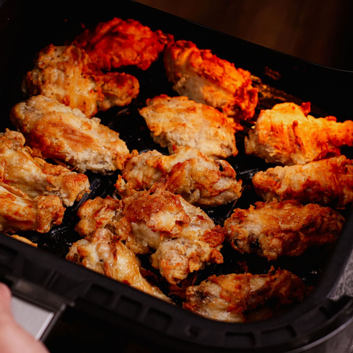 Cooking Korean fried chicken wings in air fryer.