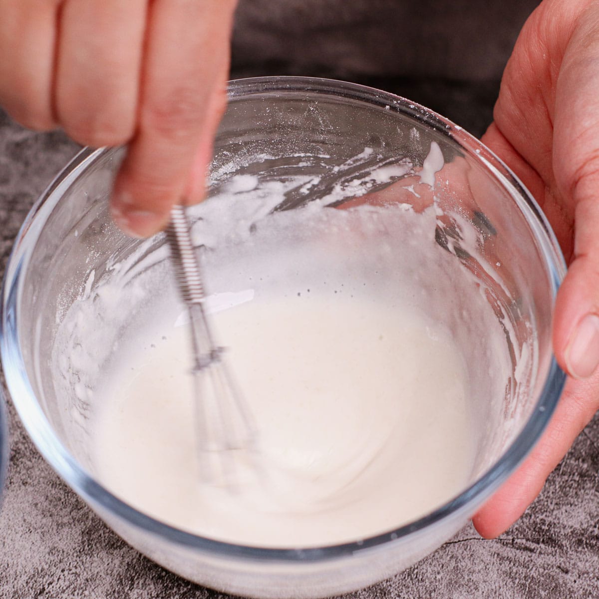 Mixing wet batter in a small bowl