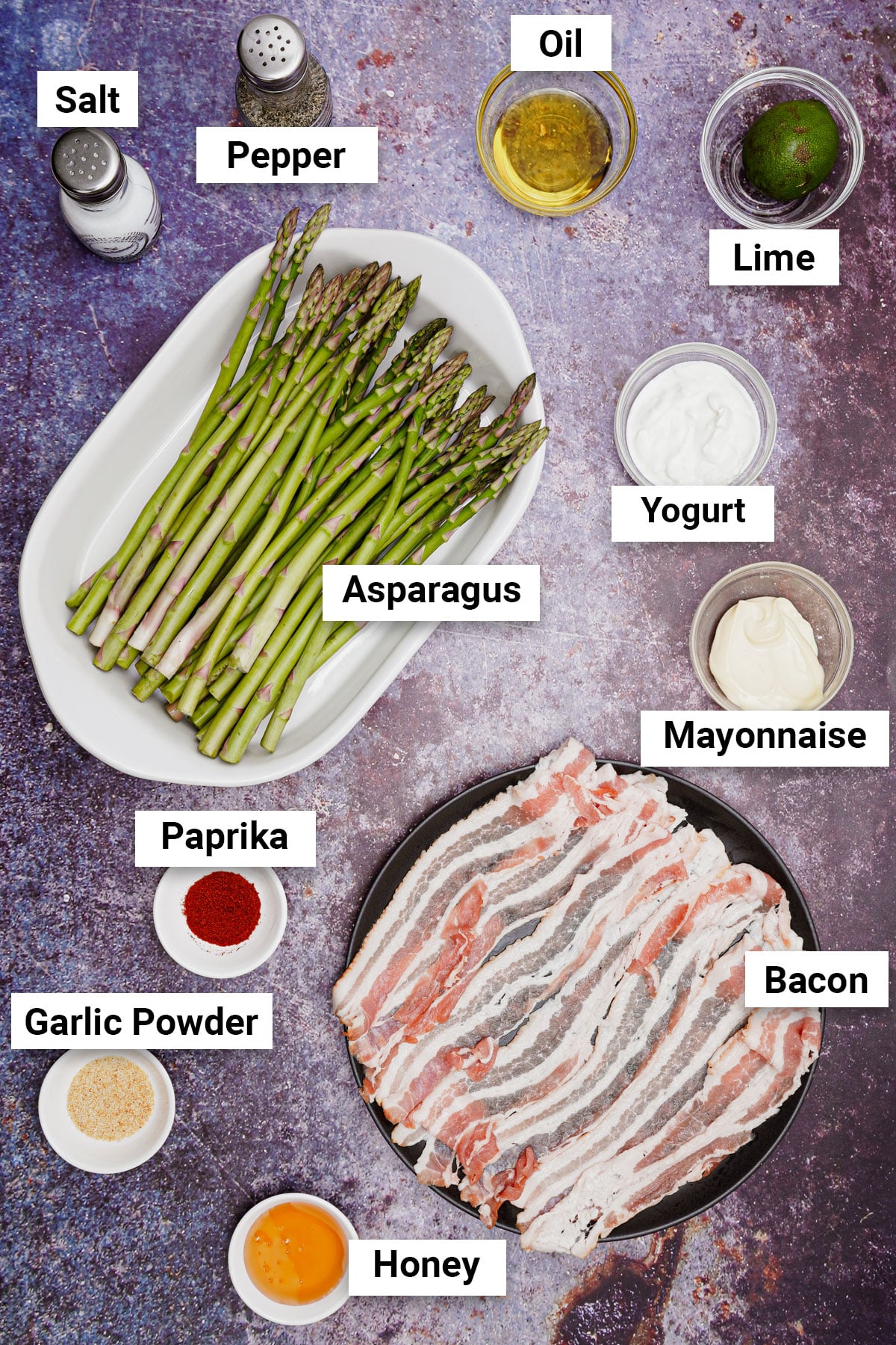 Ingredients for bacon-wrapped asparagus recipe with yogurt dipping sauce.