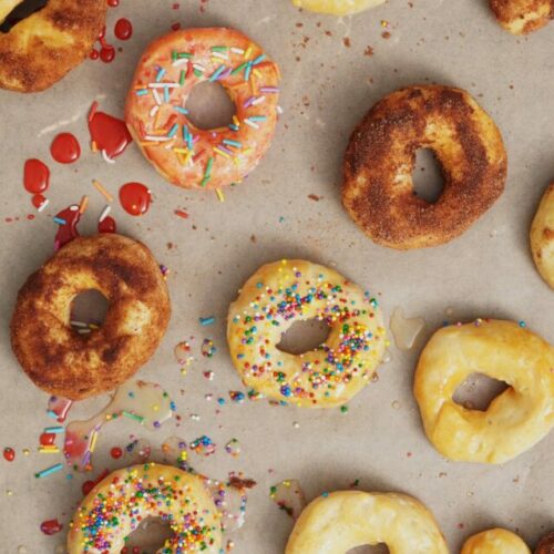 Air fryer Pillsbury biscuit donuts recipe bite shot with assorted flavors.