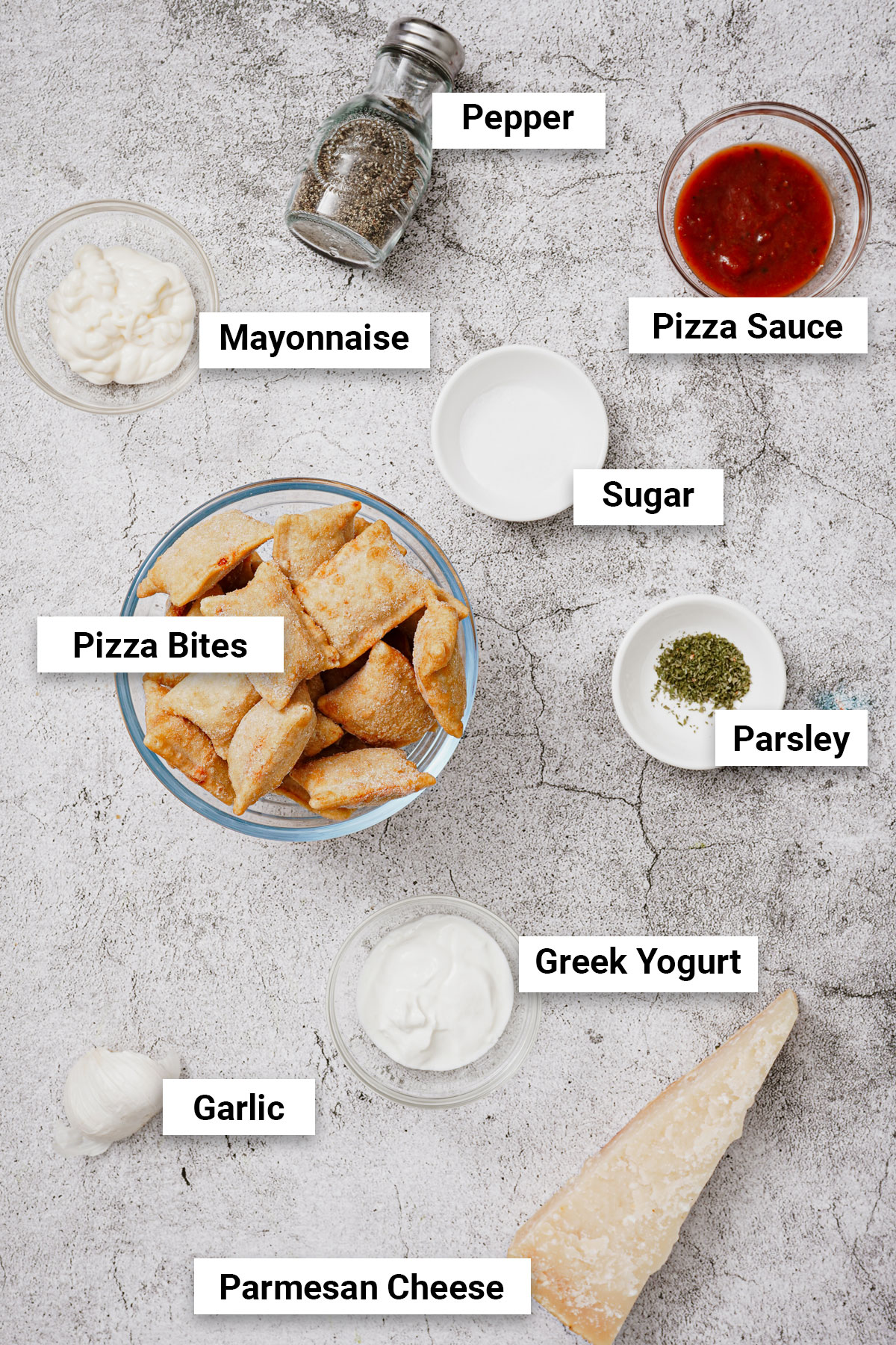 Ingredients for frozen pizza bites with dipping sauce.
