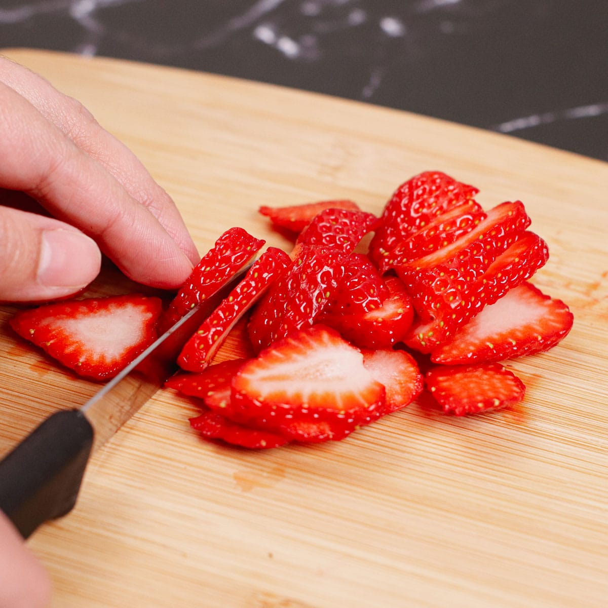 Slicing strawberries thinly