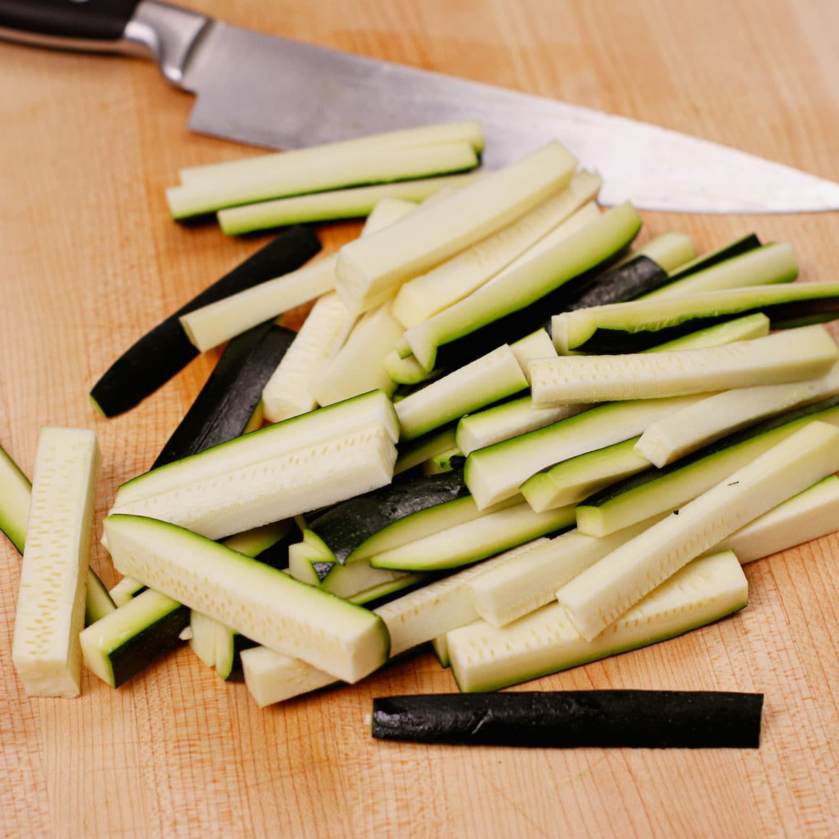 Sliced zucchini into fry-sized strips