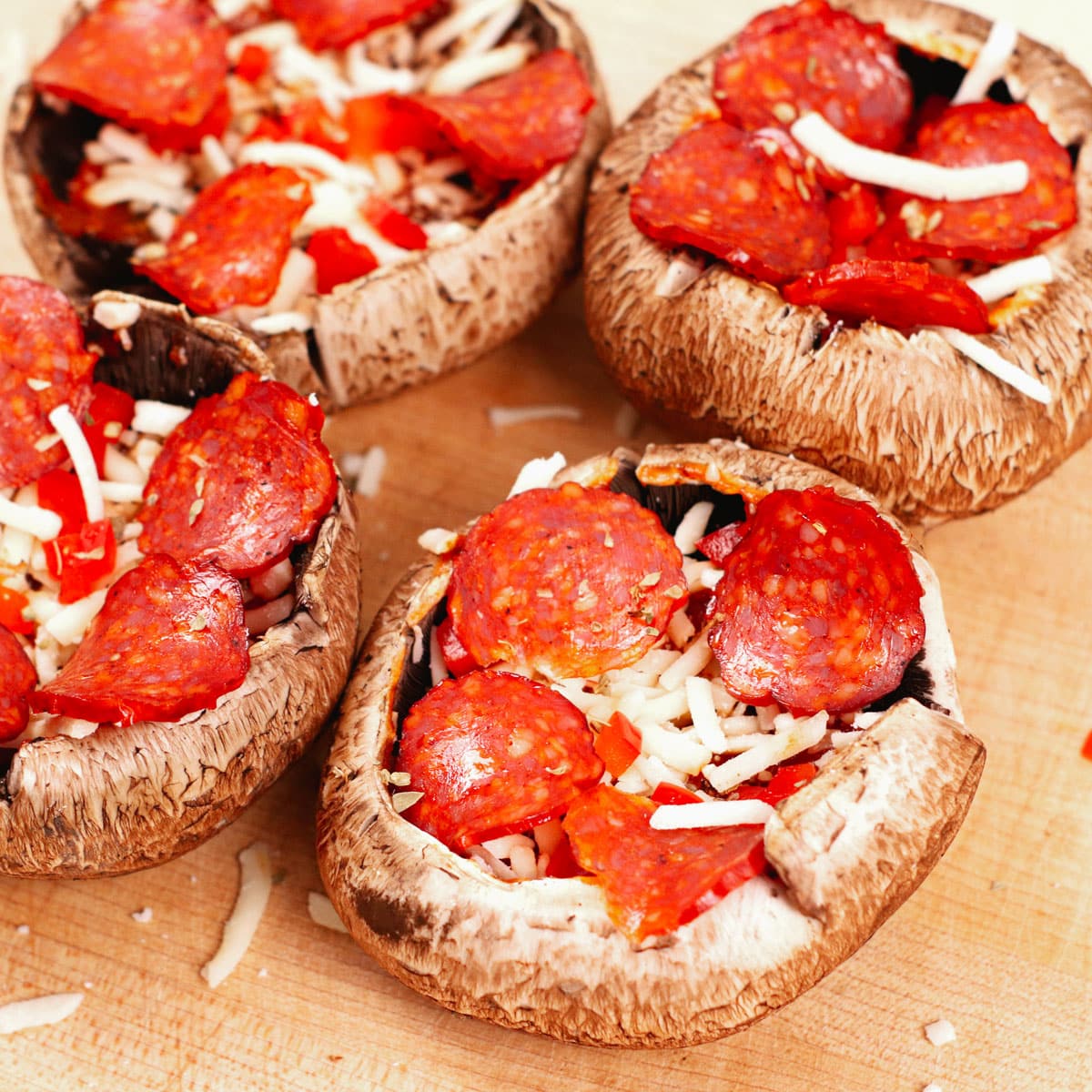 Adding pizza toppings to Portobello Mushrooms