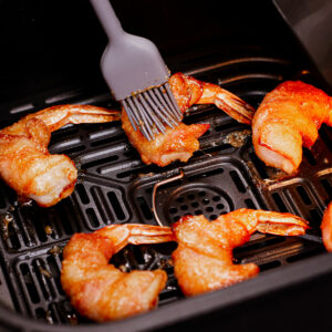 Basting bacon-wrapped shrimp in air fryer