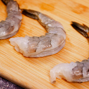 Deveined peeled shrimp with tail on