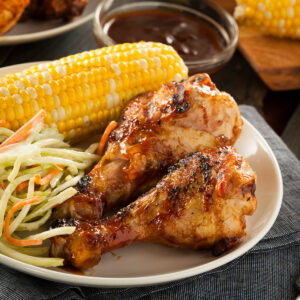 air fried BBQ chicken legs, with corn on the side