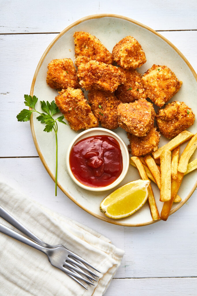 Air fryer chick-fil-a nuggets, recipe bite-shot, served with ketchup