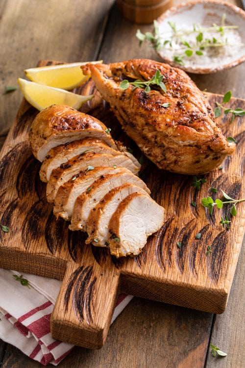 air fryer grilled chicken, recipe bite-shot, served on a chopping board