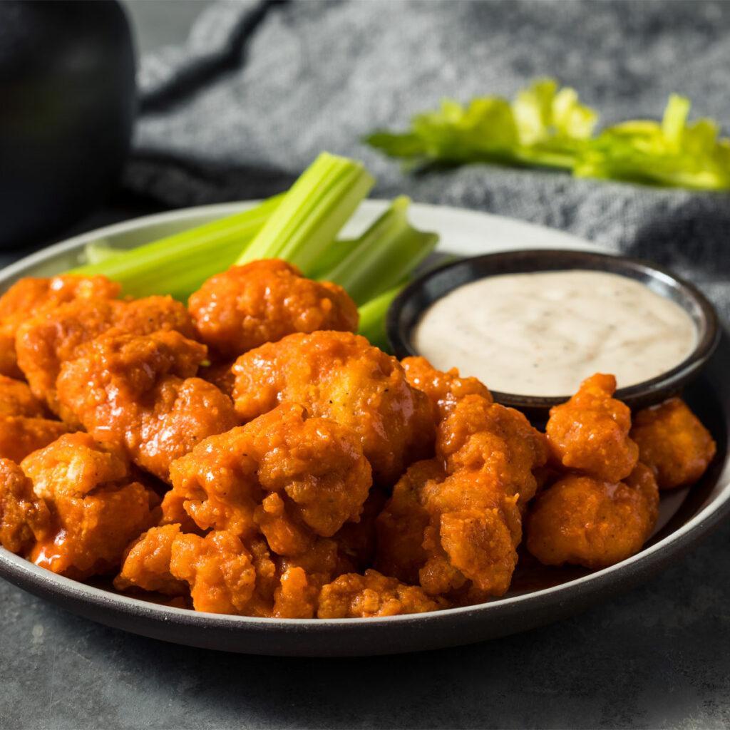 air fried buffalo chicken nuggets, served with celery sticks and ranch