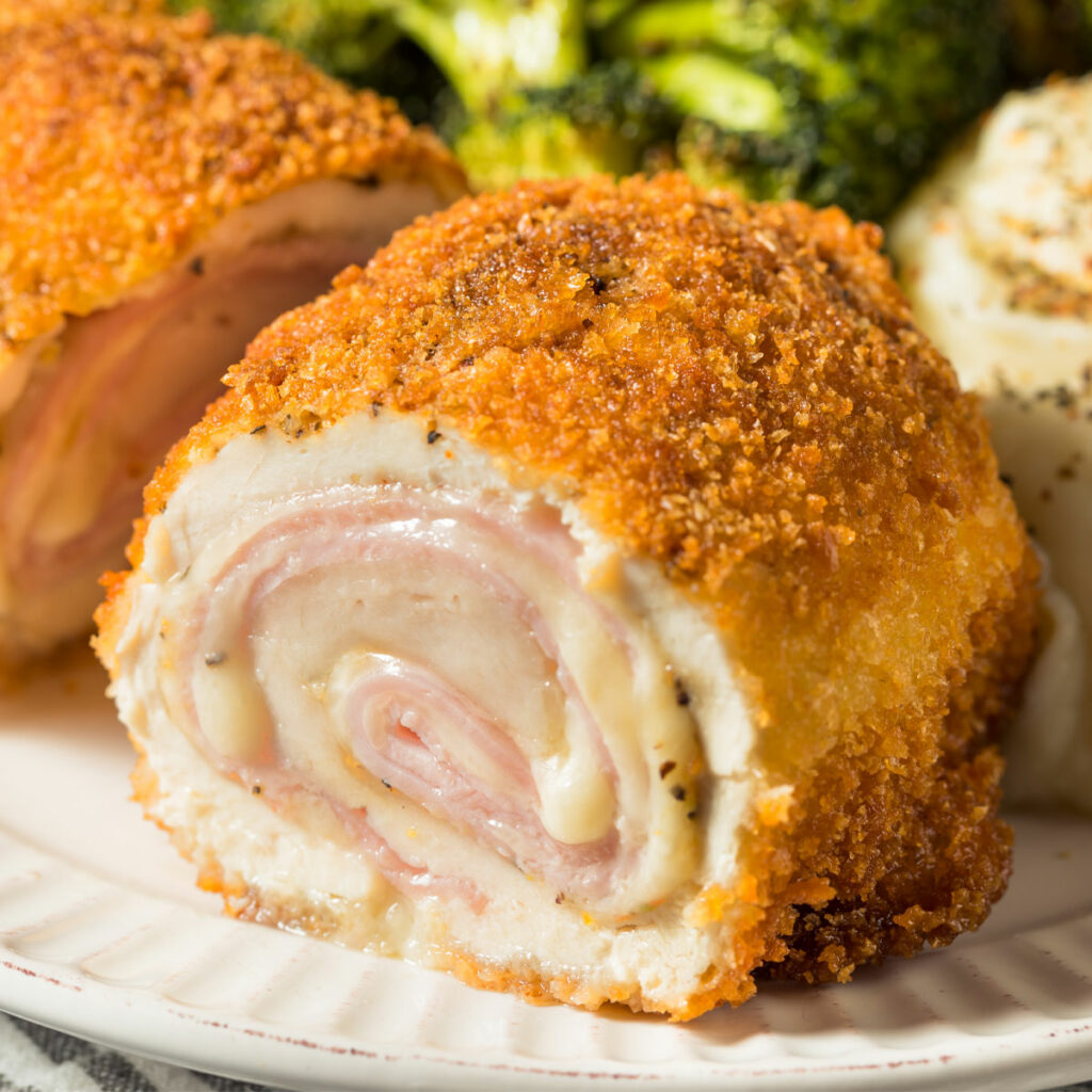 air fried chicken cordon bleu, with broccoli and mashed potato on the side