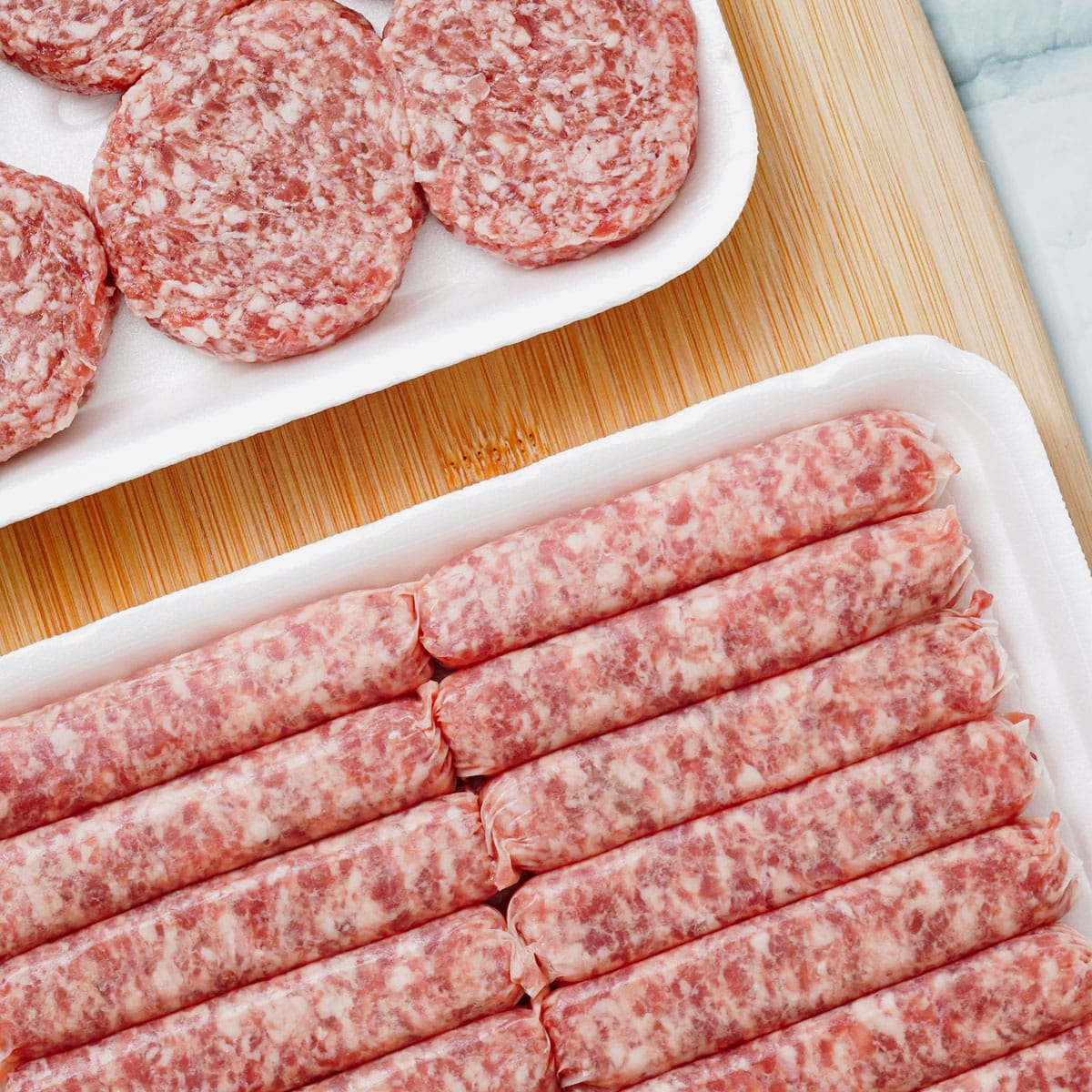 Uncooked breakfast sausage links and patties