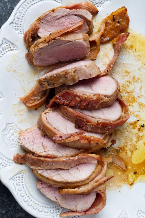 air fryer bacon-wrapped pork tenderloin, recipe bite-shot, cut into medallions