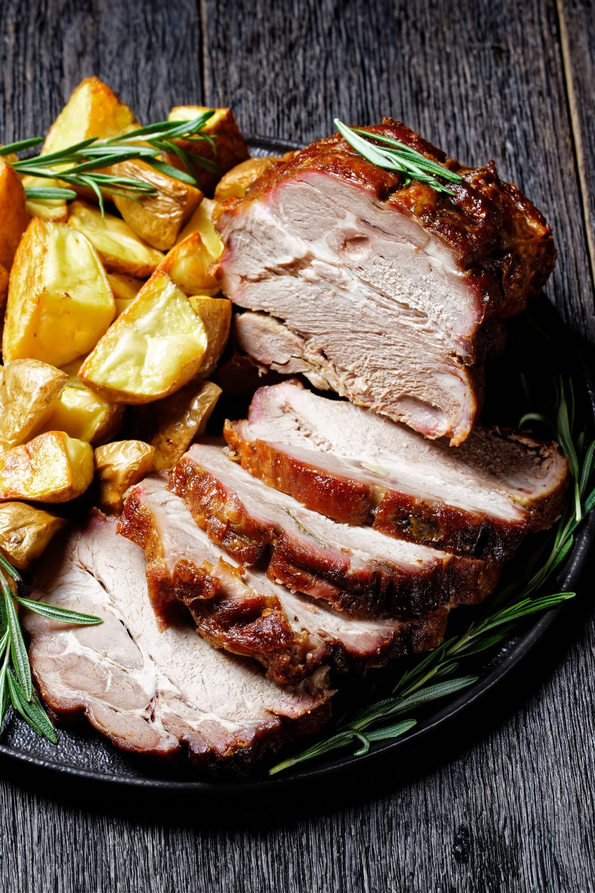 air fryer pork loin roast, recipe bite-shot, with rosemary and potatoes