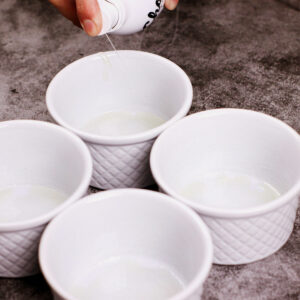 Greasing ramekin bowls with oil spray