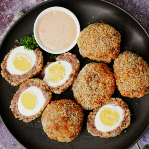 Air fryer scotch eggs with fry sauce.