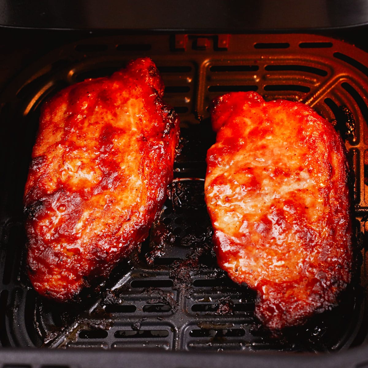 Cooking boneless pork chops in air fryer.