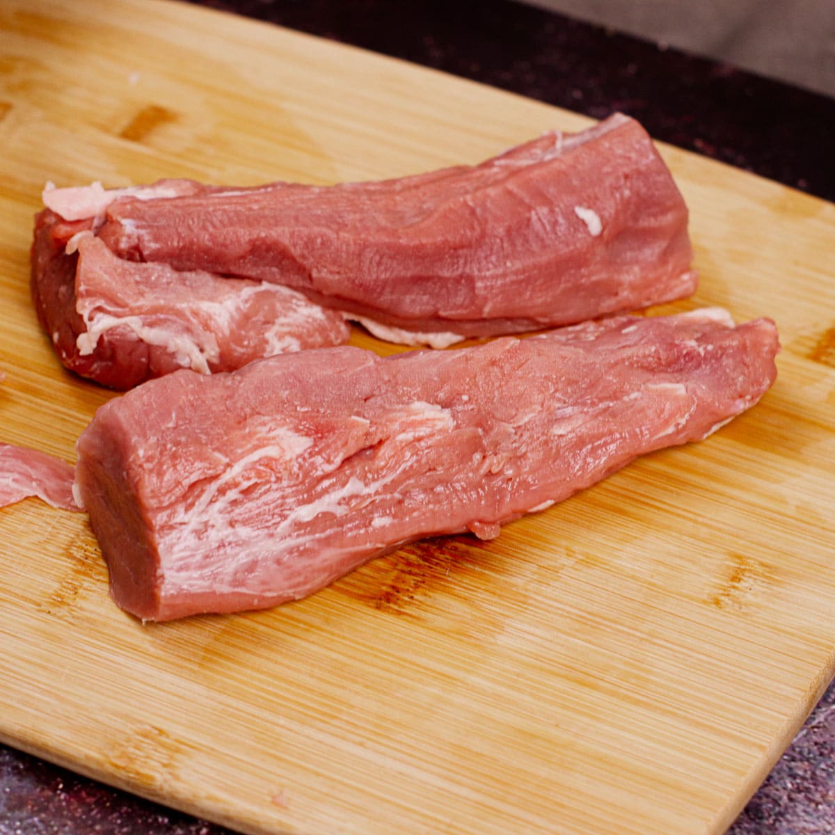 Prepped and portioned pork tenderloin